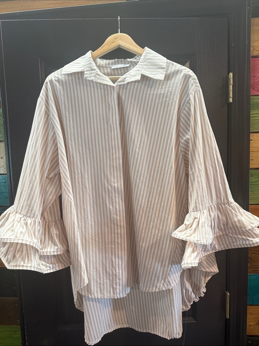 Hidden button up striped blouse. Bell sleeve, asymmetrical